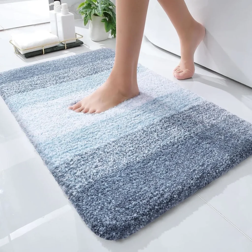 Blue ombre gradient plush bath mat in modern bathroom