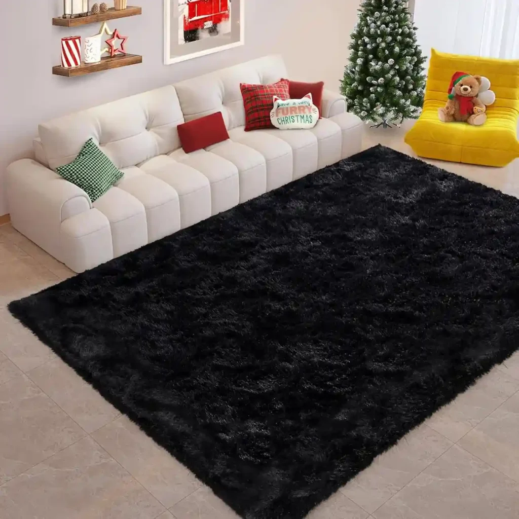 Large black shag area rug in festive Christmas living room with white sectional sofa and holiday decorations
