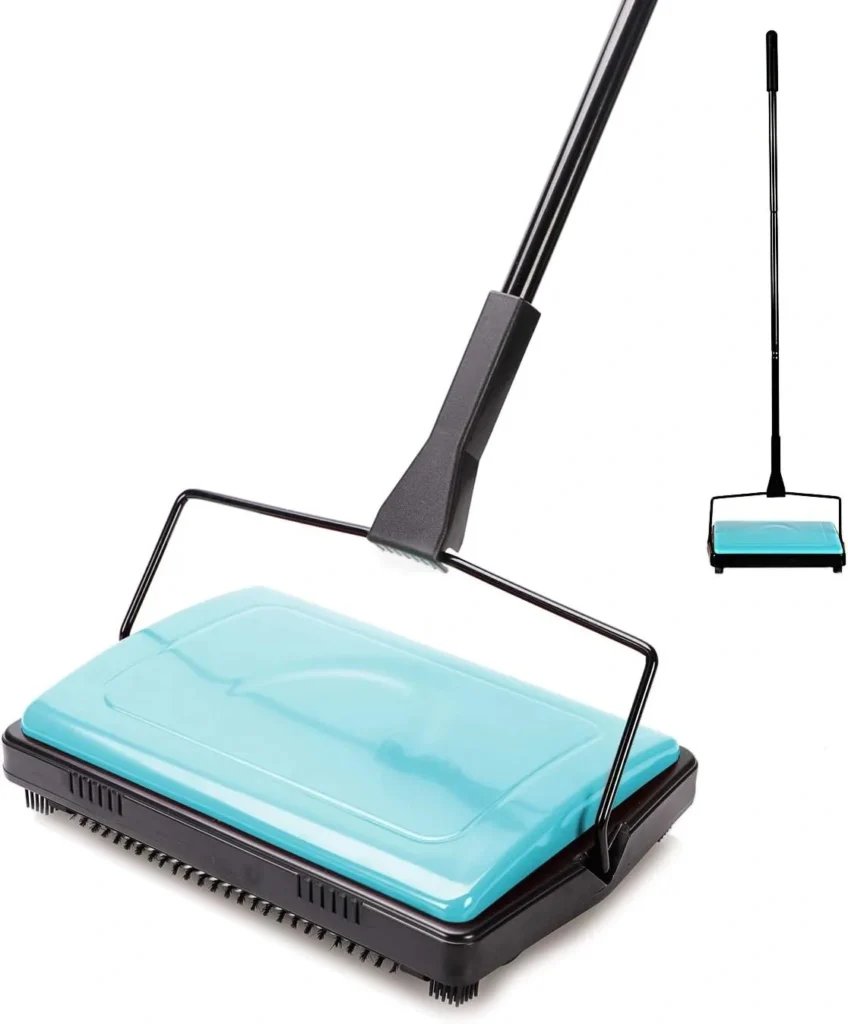 Turquoise and black manual carpet sweeper with long handle and brush base