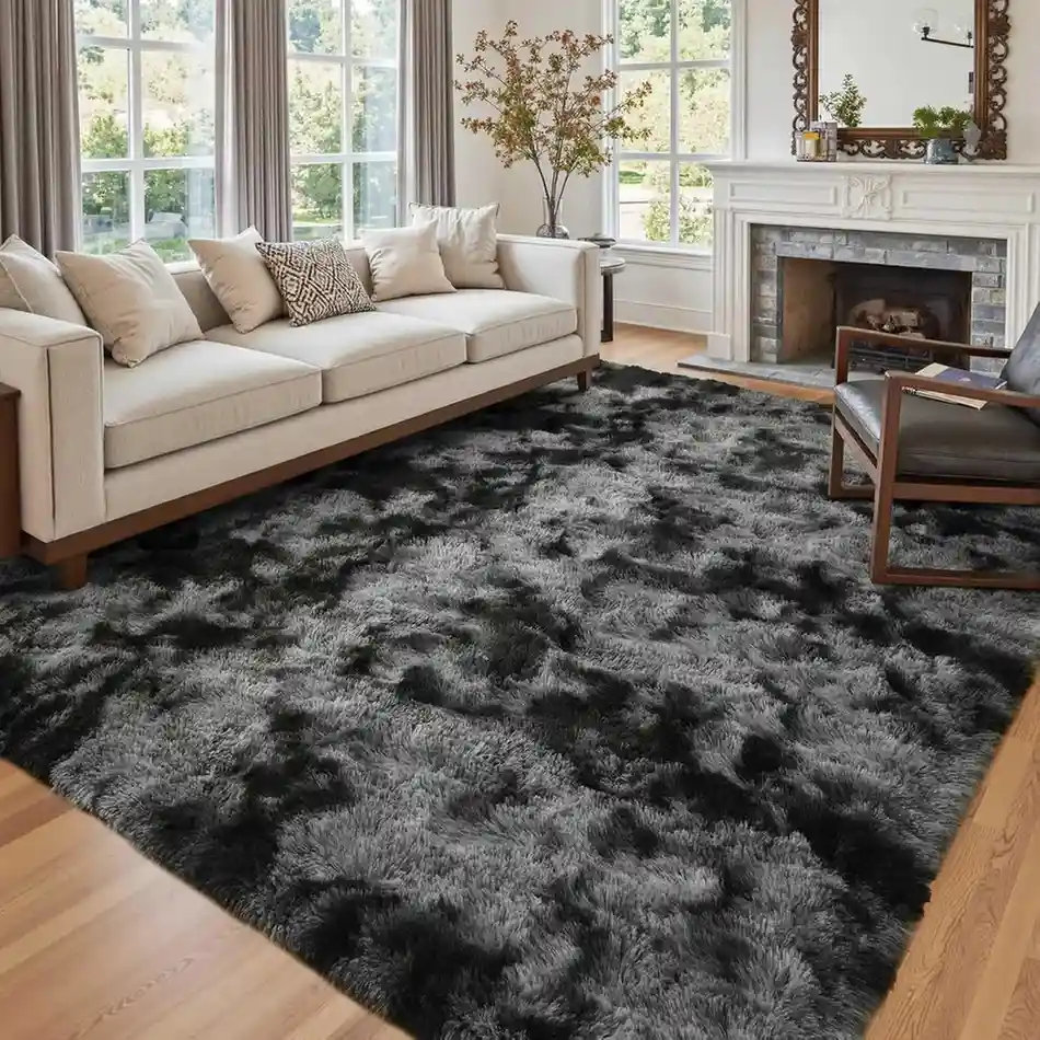 Dark grey and black fluffy shag area rug in living room